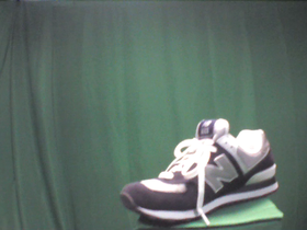 0 Degrees _ Picture 9 _ Navy Blue and White New Balance 574 Sneakers.png